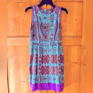 Gorgeous silky short dress in purple, turquoise and brown print. Size XS